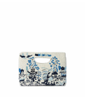Handbag with blue floral and architectural design on a white background