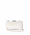 White clutch bag with black embellishments on a white background