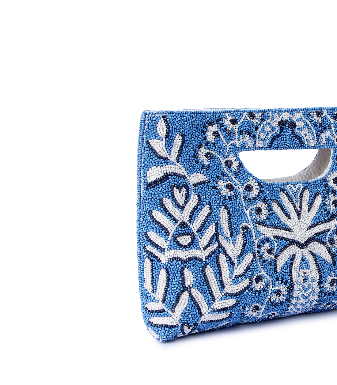 Blue clutch bag with white floral patterns on a white background
