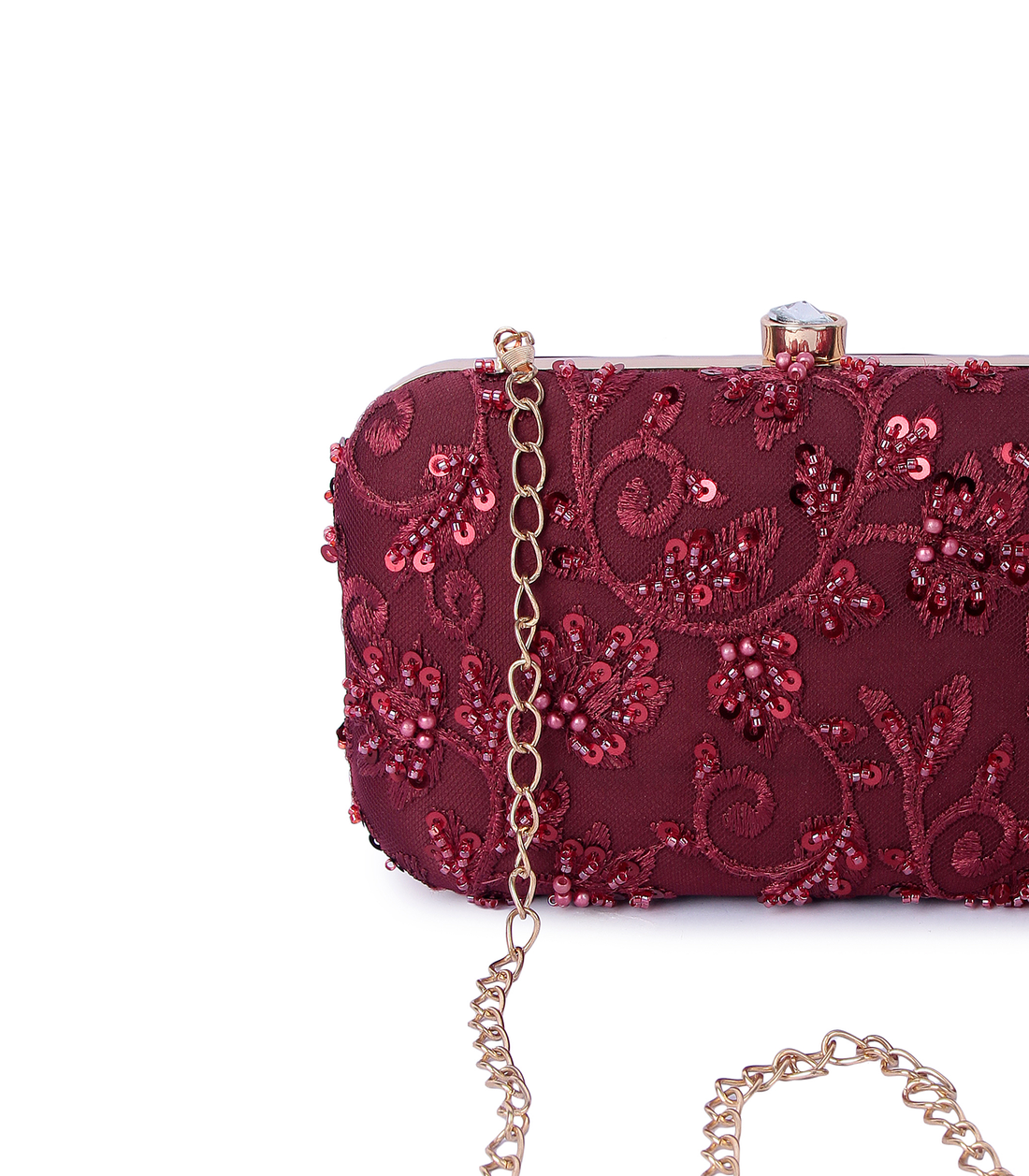 Red embroidered clutch bag on a white background