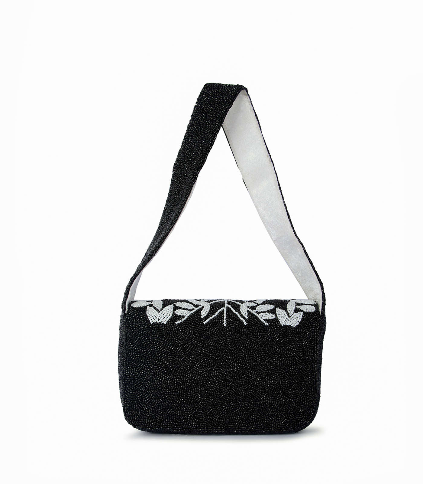 Black handbag with floral pattern on a white background