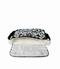 Floral embroidered clutch bag on a white background
