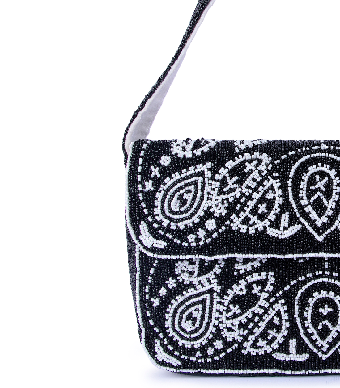 Black handbag with white paisley pattern on a white background