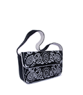 Black handbag with white paisley pattern on a white background